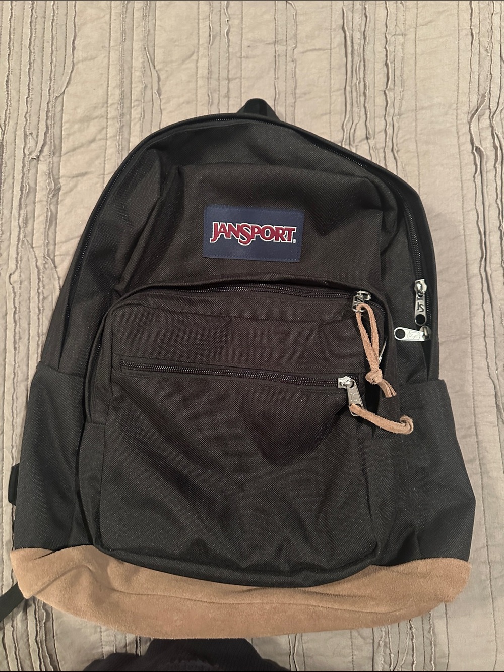 Jansport Black Backpack with Tan Suede Base